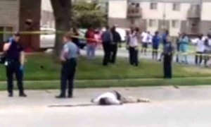 Michael Brown’s body was not immediately covered and was recorded on video by bystanders. JAMES CLAY, VIA NEWS2SHARE