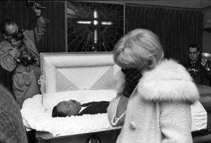 Mourner viewing MLK's body at R.S. Lewis Funeral Home. Mr. Lewis prepared King's body so well that his face and neck were seemingly restored to their previous state before the shooting. 
